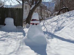 The cheerful snowman we built a few weeks ago has been buried alive